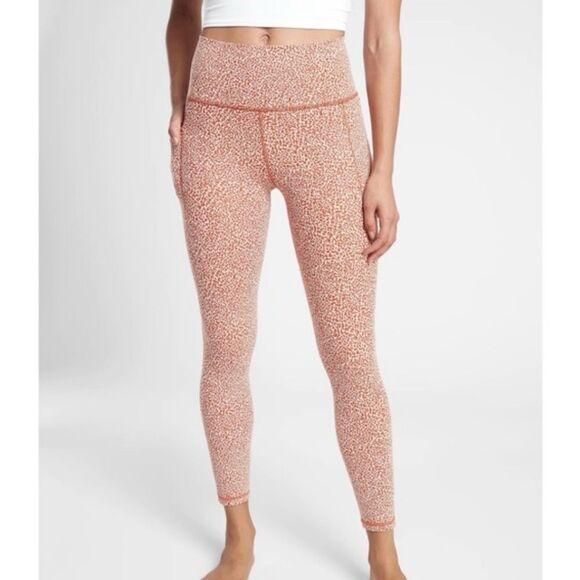Athleta Rust Cheetah Print Salutation Stash Textured 7/8 Pocket Leggings - Picture 2 of 11